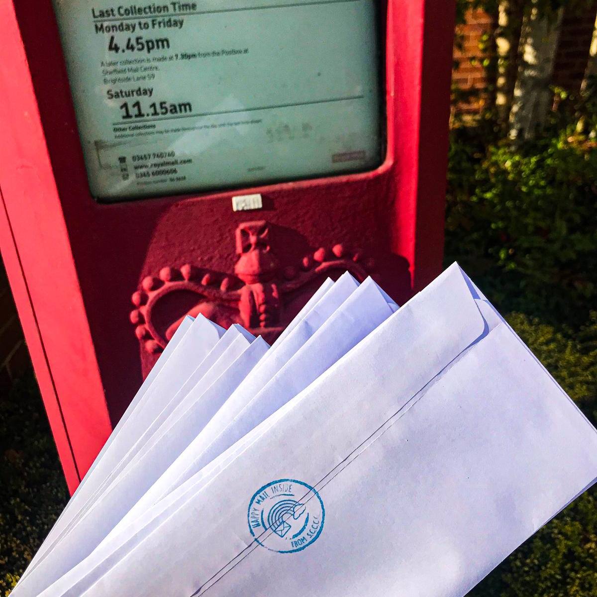 Letters stamped with the SCCCC logo being posted