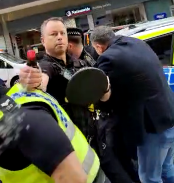 Police and demonstrators clash during protest in Sheffield city centre