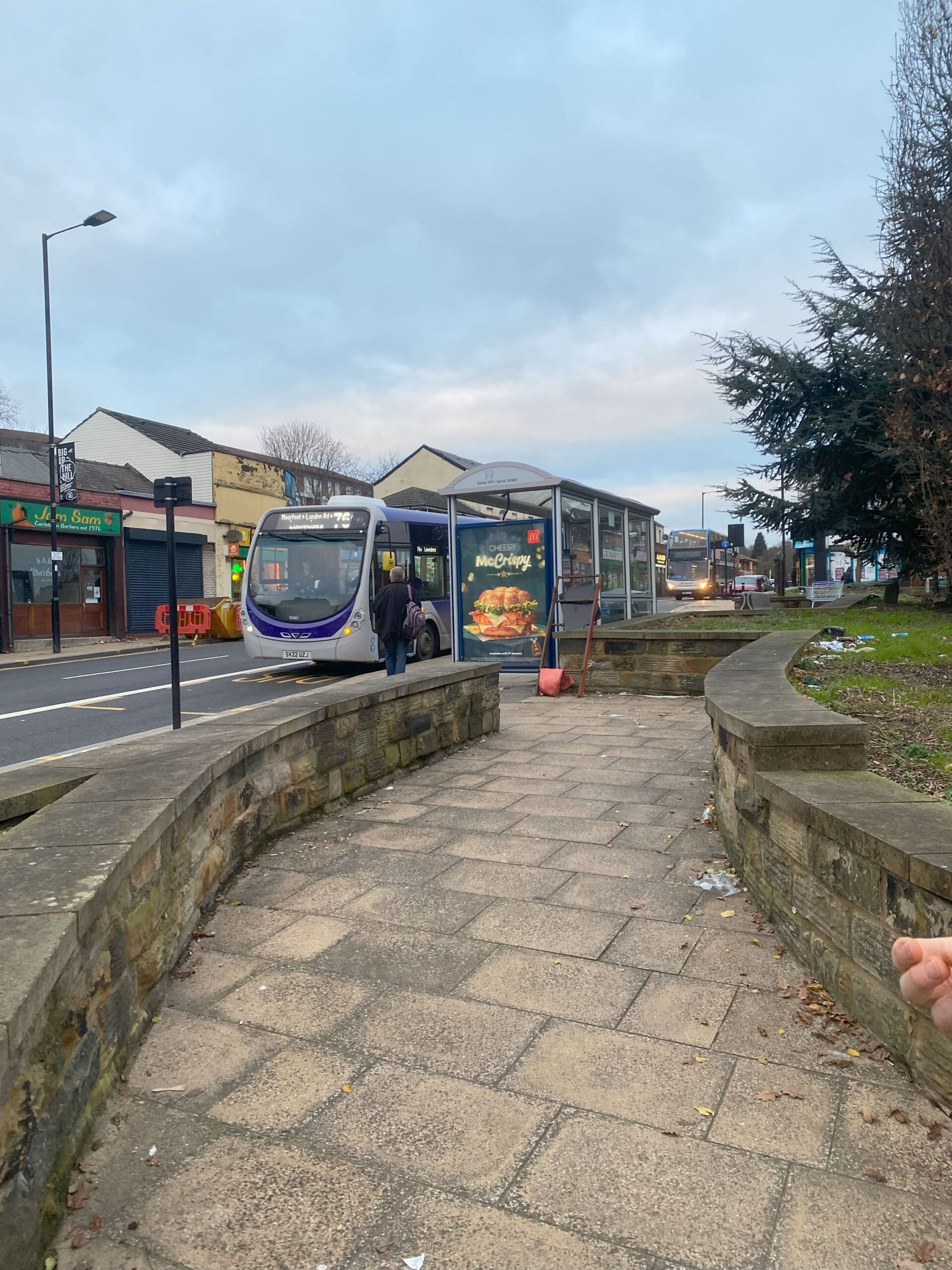 Twi busses on the road in Burngreave.