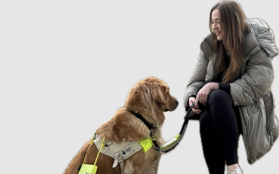 Emily Lamb with her guide dog, Garth