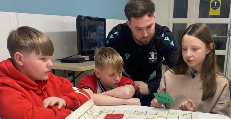 Children taking part in sessions at Wincobank Village Hall (credit: Emma Glasbey/BBC)