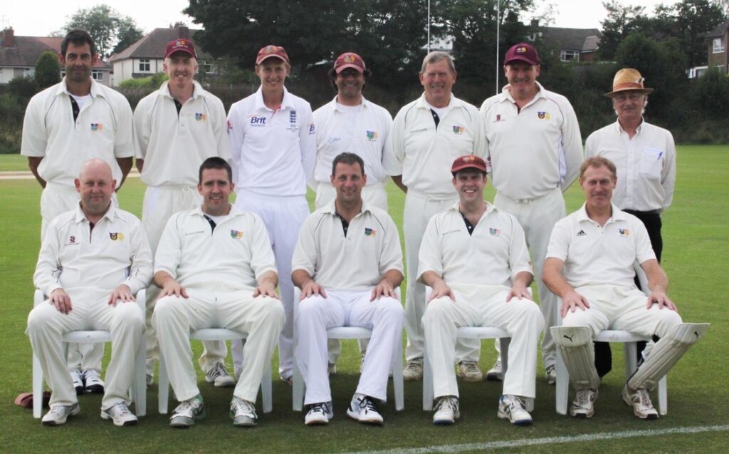 Root in a team photo with the SCCC 4th team in his full England kit