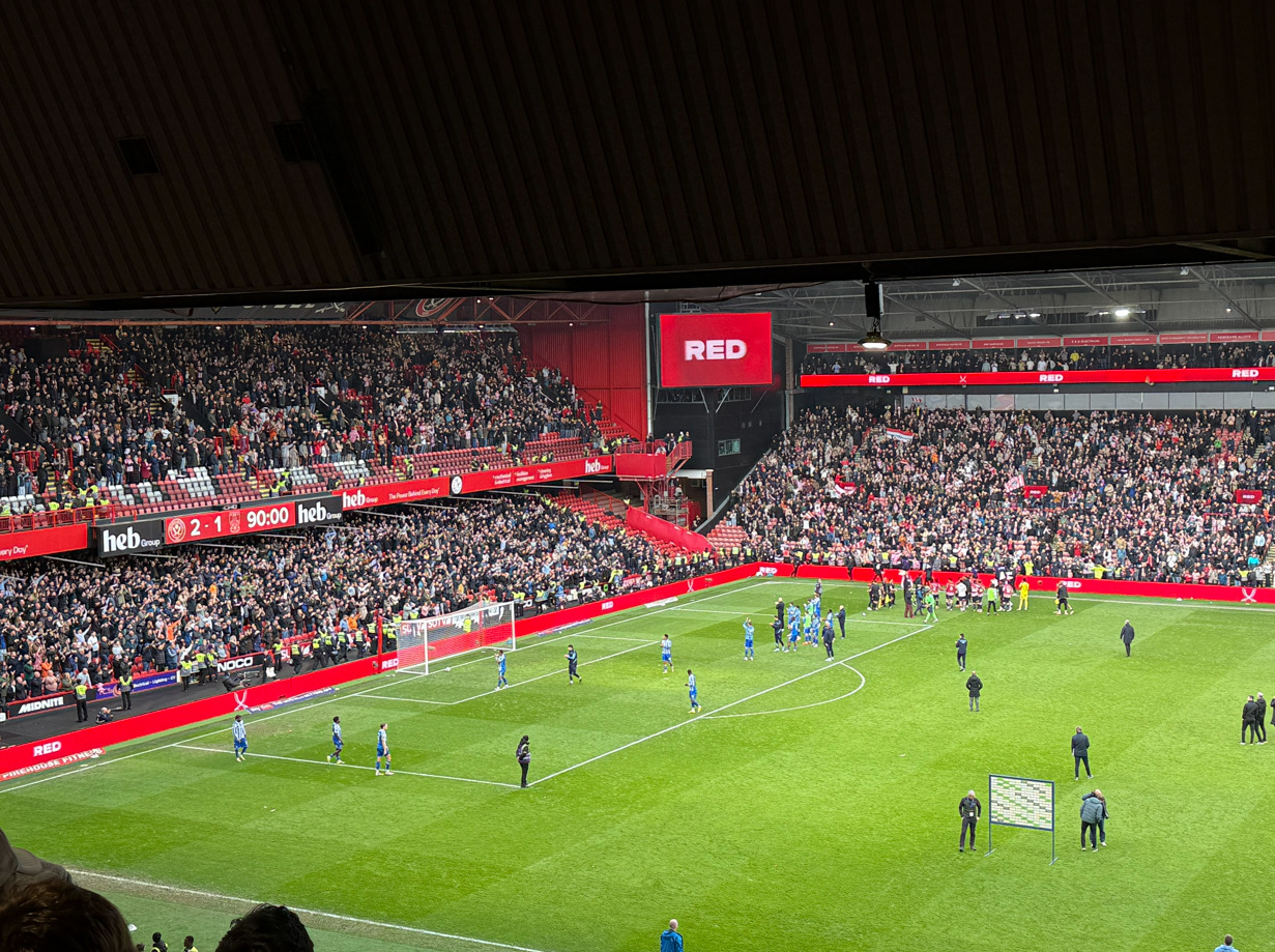 A photo of Sheffield Wednesday players clapping the audience at Full-Time in their game against Sheffield United