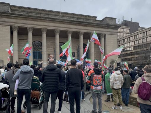 Crowds gather outside City Hall after the death of Iran’s supreme leader
